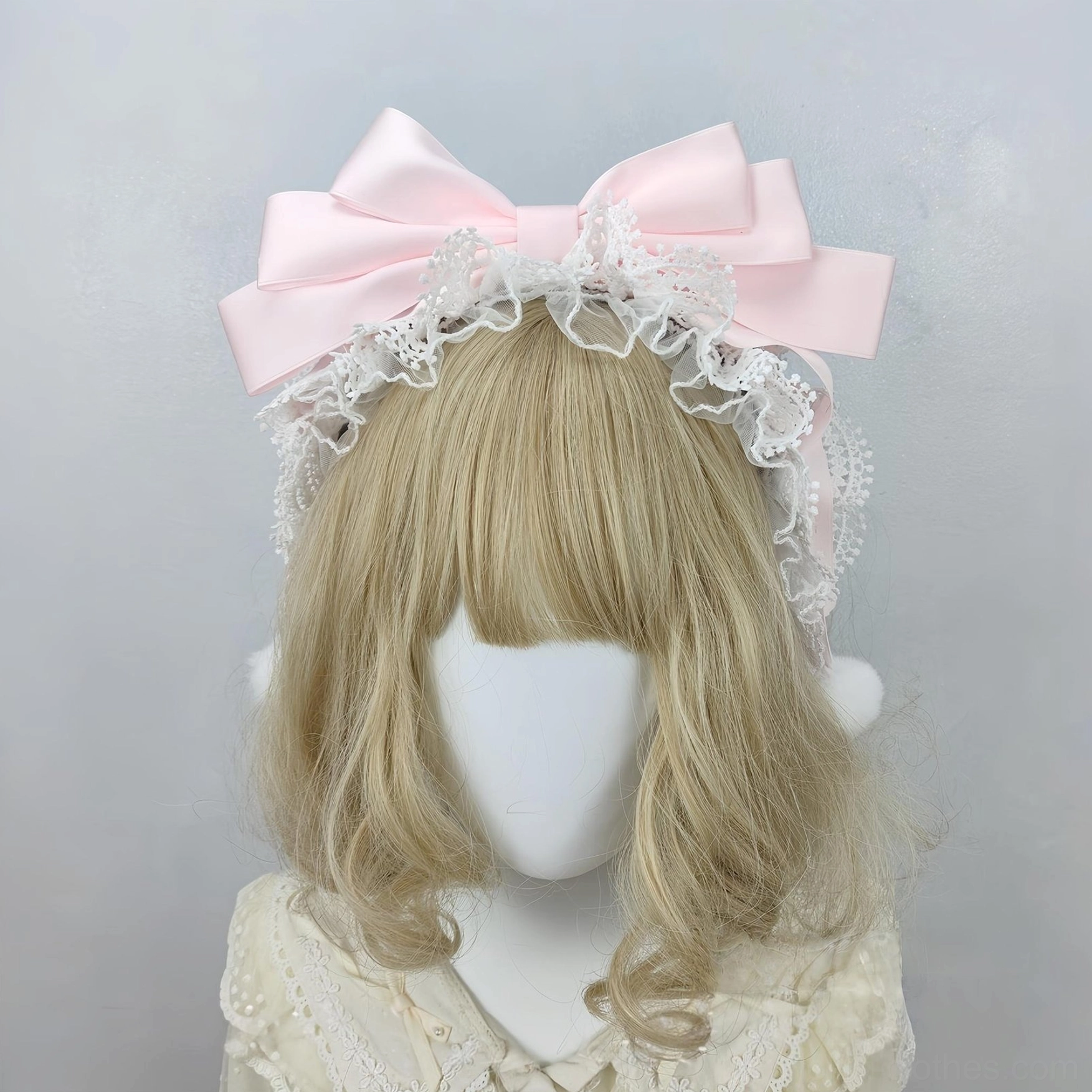 Pure Light Pink Sweet Lolita Oversized Bow Headdress with White Ruffled Lace Trim and Pompom Accents on Mannequin