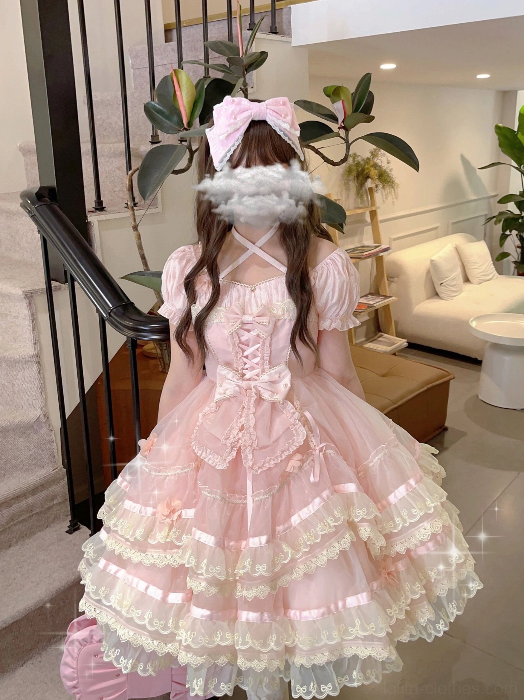 Light pink sweet lolita pearl bow KC cloud-shaped hair accessory back view on model with twin hair pink frilly layered dress staircase background