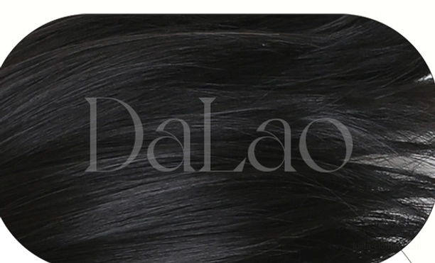Close-up macro photograph of sweet lolita long straight wig hair texture showing silky dark brown-black synthetic fibers and high-temperature silk quality in flat lay detail view