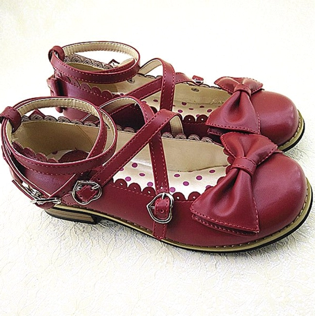 Sweet Lolita princess low heel Mary Jane shoes styling flat lay showcasing construction quality, PU material durability, metal buckle hardware, and decorative bow front design