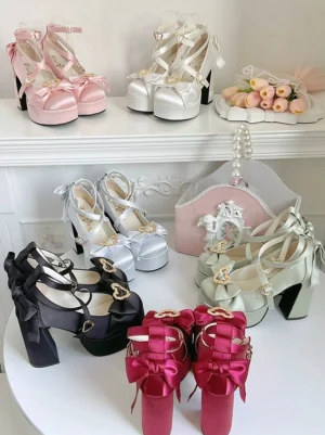 Assorted Sweet Lolita Mary Jane heart bow platform heels in multiple colors including black white pink green displayed flat lay with cute accessories