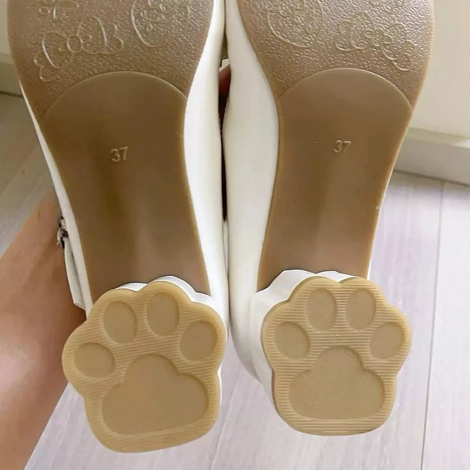 Floral printed insole detail of sweet lolita Mary Jane heels showing soft microfiber synthetic leather cushioning, delicate flower pattern design, and interior comfort construction, displayed with product positioning to highlight decorative inner lining