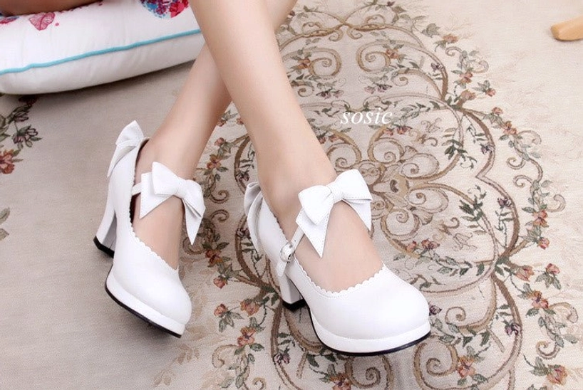 Sweet Lolita Mary Jane platform heels detailed view showcasing heart-shaped buckle mechanism adjustable ankle strap and bow decoration across available colorways