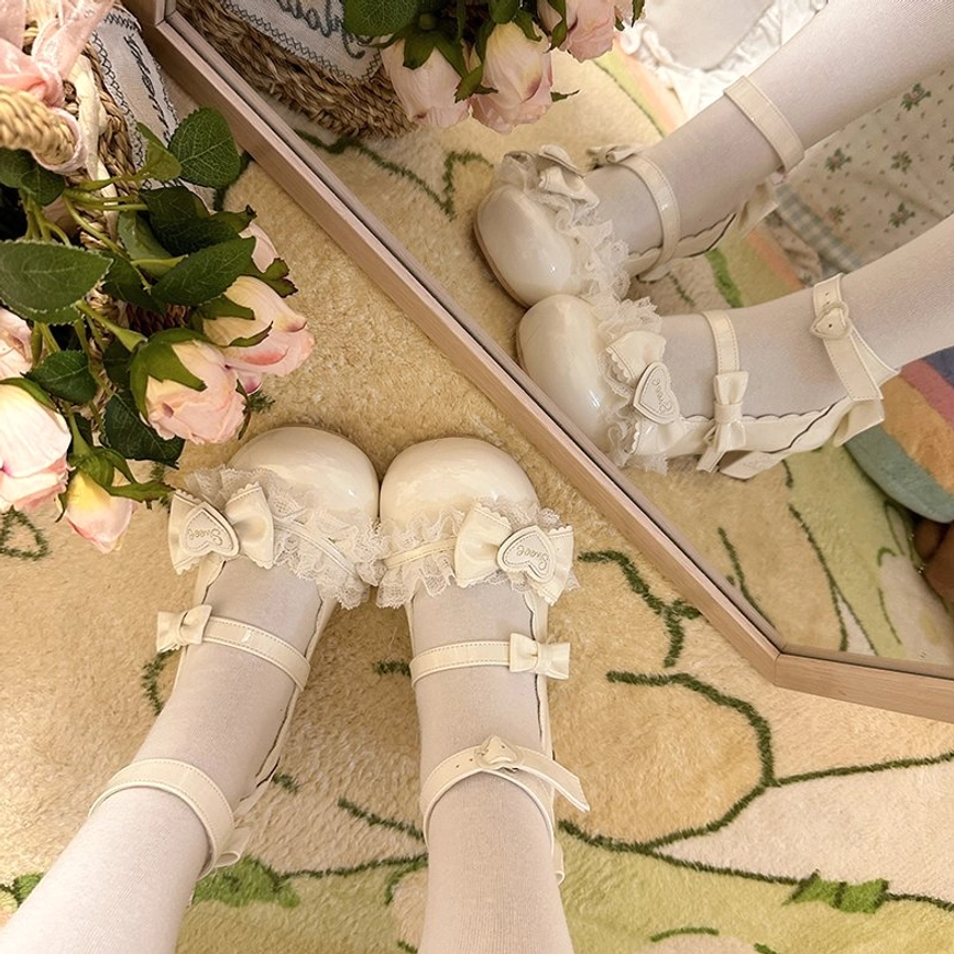 Sweet lolita mary jane heels detailed product photography showing full shoe profile design elements lace embellishments and mary jane buckle strap from side angle