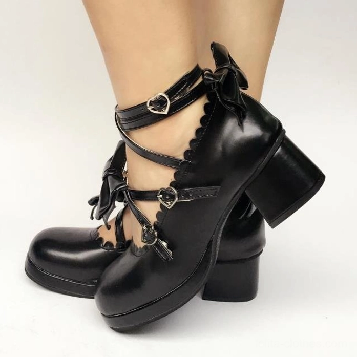 Sweet Lolita Mary Jane platform shoe close-up of heart-shaped metal buckle hardware and scalloped inner collar finishing details