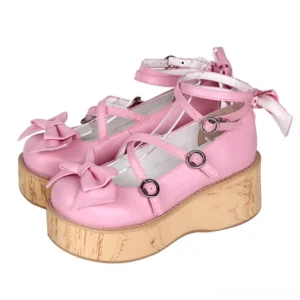 Sweet Lolita platform Mary Jane shoes pair front view with tender pink microfiber leather upper, delicate toe bows, cross metal buckle straps, and distinctive wood-grain thick platform soles
