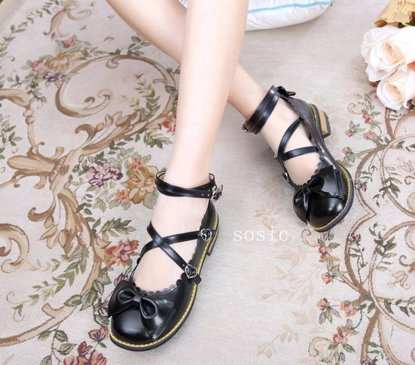 Sweet Lolita Mary Jane shoes cross strap design showing dual ankle strap configuration and heart buckle placement