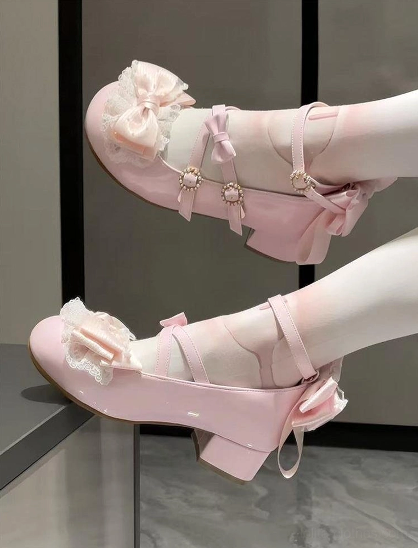 Sweet pink glossy Lolita Mary Jane shoes with ruffled satin toe bow gem-embellished ankle buckles block heel and detachable back bow worn with white stockings