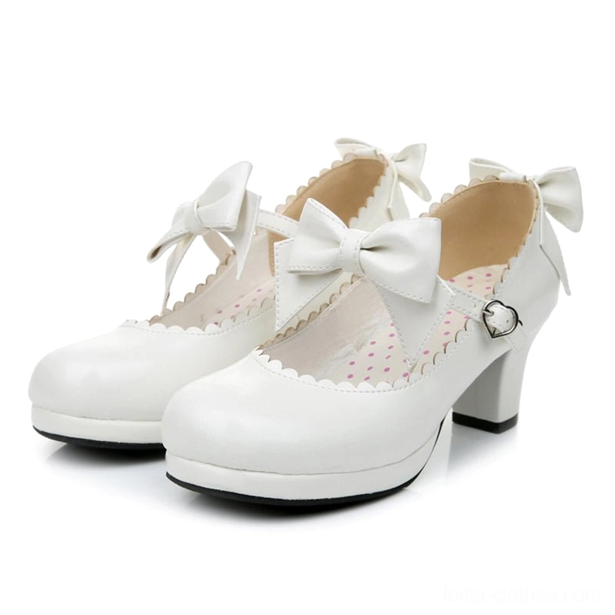 White sweet Lolita Mary Jane chunky block platform heels frontal flat lay showing large ankle bow polka dot inner lining smooth leather and substantial heel height