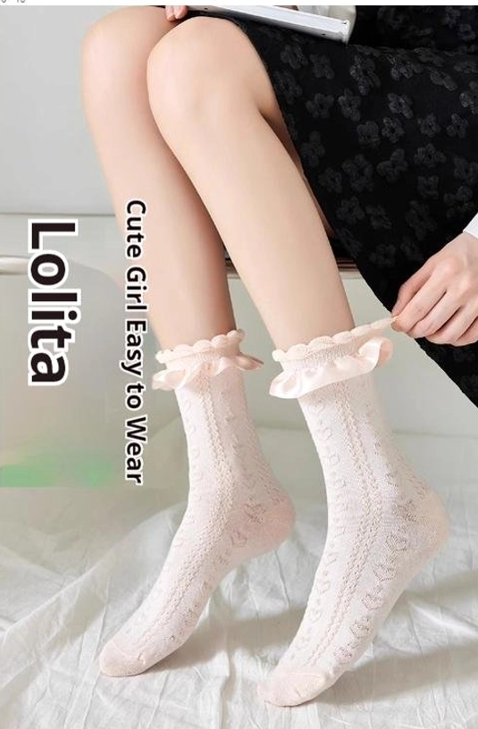Sweet Lolita mid-calf socks close-up detail view showing ruffled lace ankle cuff twisted knit texture heart pattern embellishment