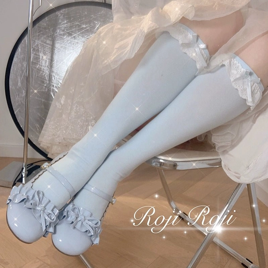 Multiple pairs sweet lolita mid-calf socks with bow details and lace trim displayed showing versatile color range and mid-calf length perfect for lolita fashion coordinates