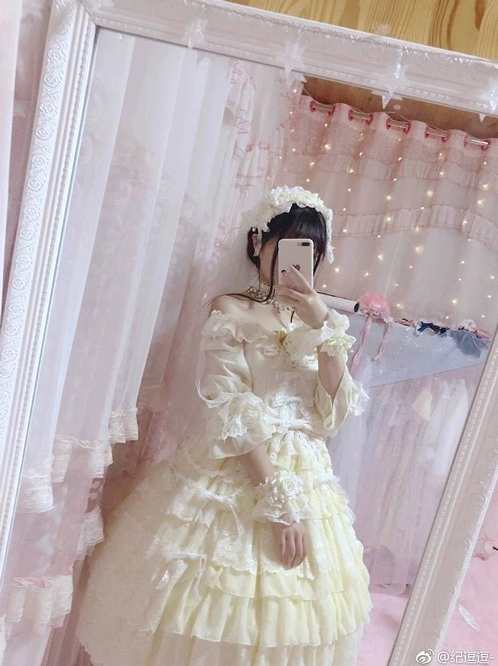 Sweet Lolita OP dress with hand-wash chiffon outer fabric and cotton lining, delicate care required for maintaining elegance