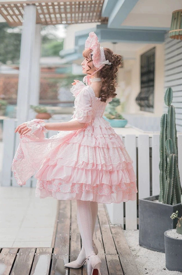 Sweet Lolita one-piece dress with soft chiffon fabric, delicate lace overlays, tiered ruffle construction, and lace-trimmed edges