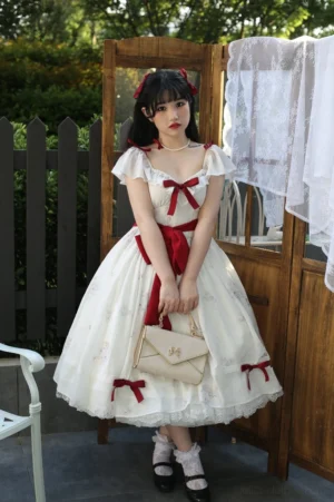 Enchanted Floral Sweet Lolita OP One-Piece Dress Full Body Front Standing Shot in Vintage Outdoor Courtyard with Red Ribbon Details