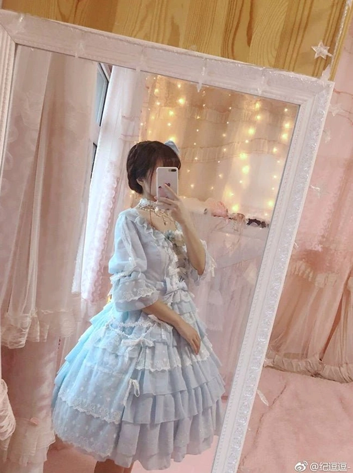Sweet Lolita one-piece dress with half-puff sleeves, lace trims, and romantic fairy-tale silhouette suitable for tea parties and conventions