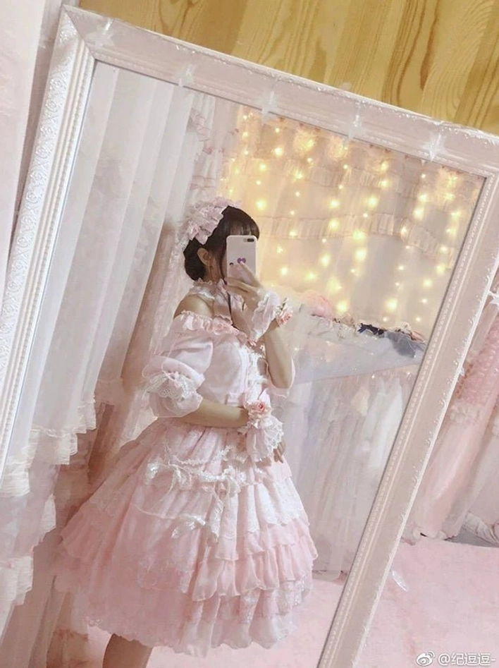 Sweet Lolita one-piece dress featuring removable accessories including waist bow and eight interchangeable hem bows for mix-and-match styling