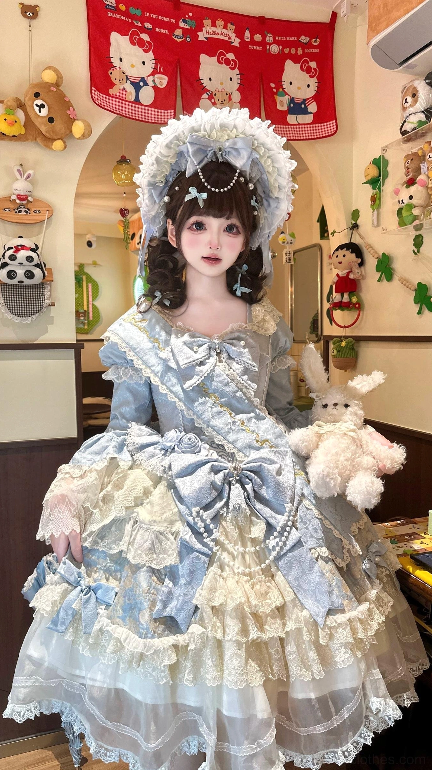Lolita girl wearing royal-style sweet OP dress with lace bonnet indoor plush toy shop background full-body front portrait wide satin sash large bow
