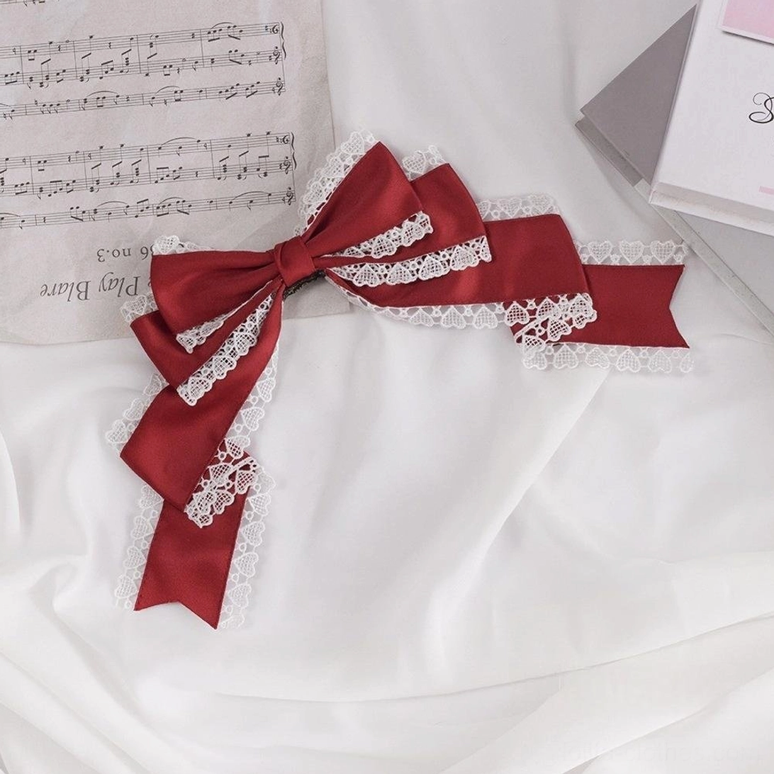 Sweet lolita oversized bow headdress attachment mechanism kc clip comparison close-up