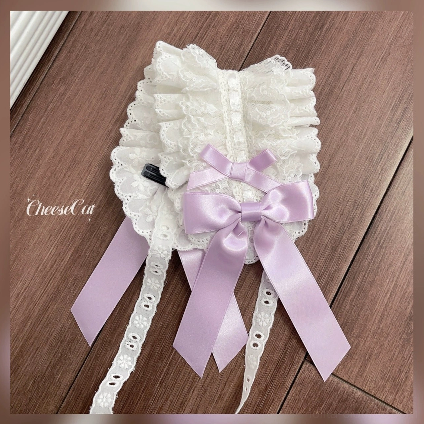 Sweet Lolita pastel color headband with ruffled lace edges and decorative satin bow perfect for completing Lolita fashion outfits