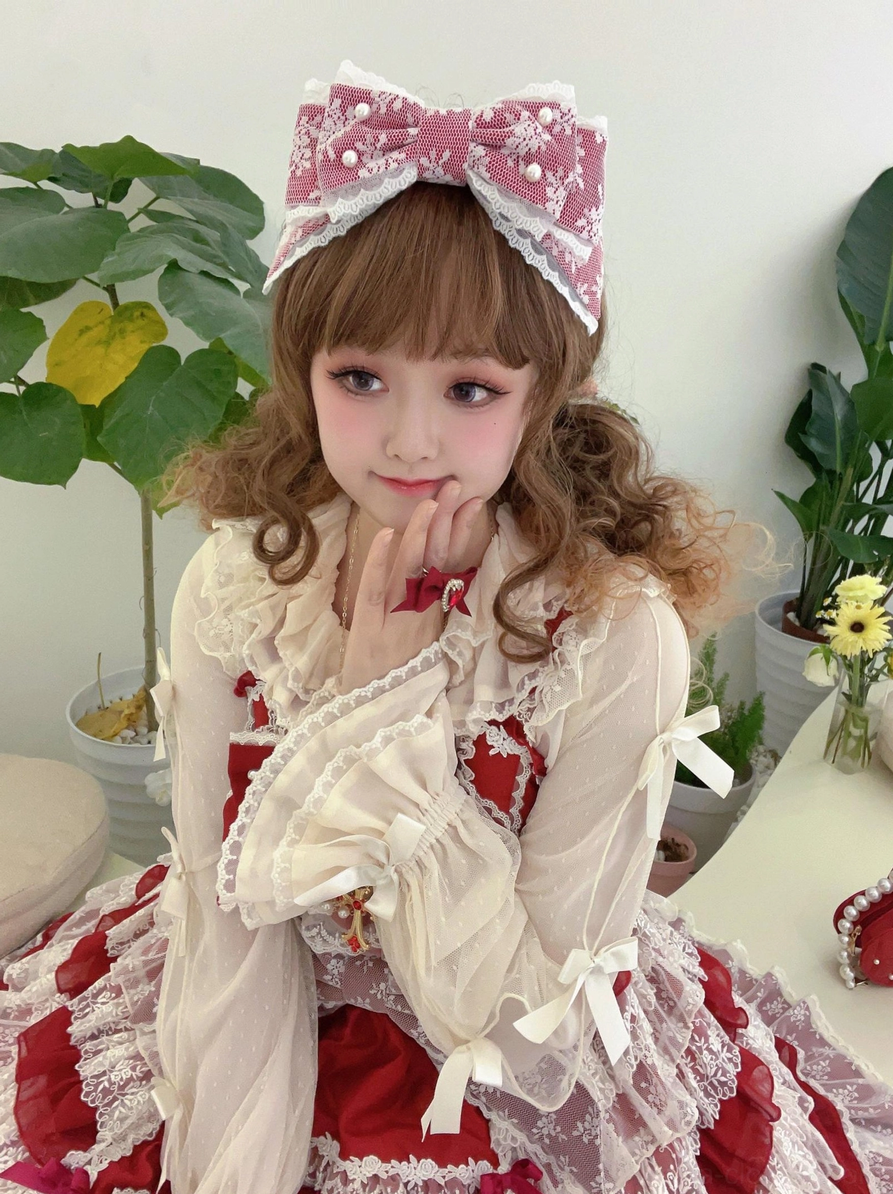Sweet lolita pearl-trimmed KC headband overhead flat lay showing bow structure and lace embellishment design