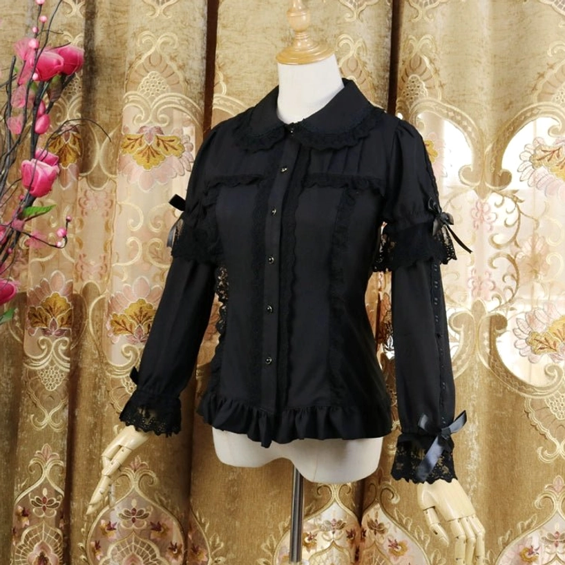 Sweet lolita Peter Pan collar chiffon blouse flat lay detail showing lace embellishments, ruffled sleeves, and overall blouse design elements