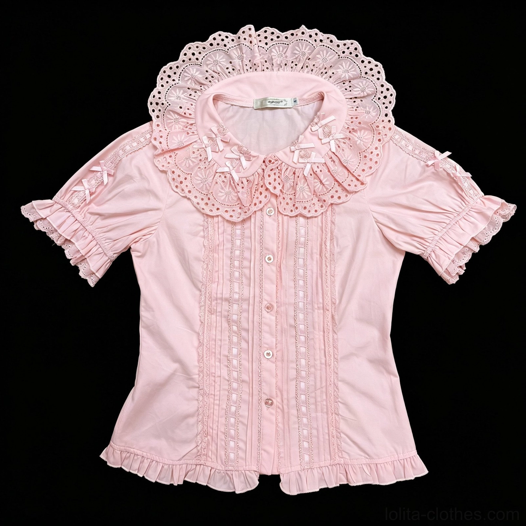 Sweet Lolita Peter Pan collar blouse layered ruffles and pintuck details on bodice showing architectural design elements