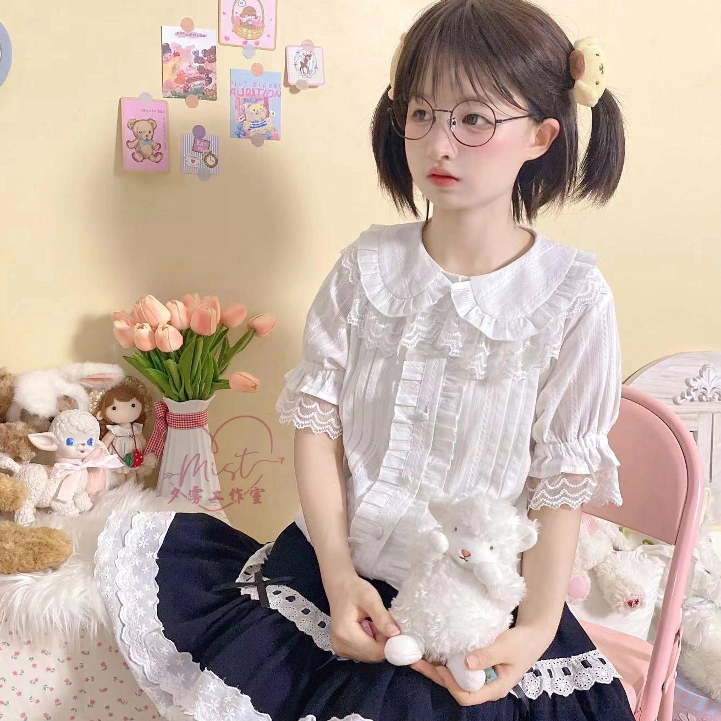 Lolita peter pan collar short sleeve blouse puff sleeves lace cuffs front button placket model sitting pastel decor