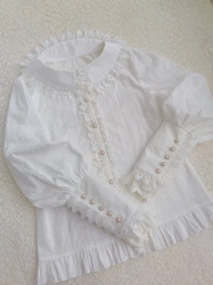 Sweet Lolita Peter Pan collar white cotton blouse with puffed sleeves and lace trim flat lay top view