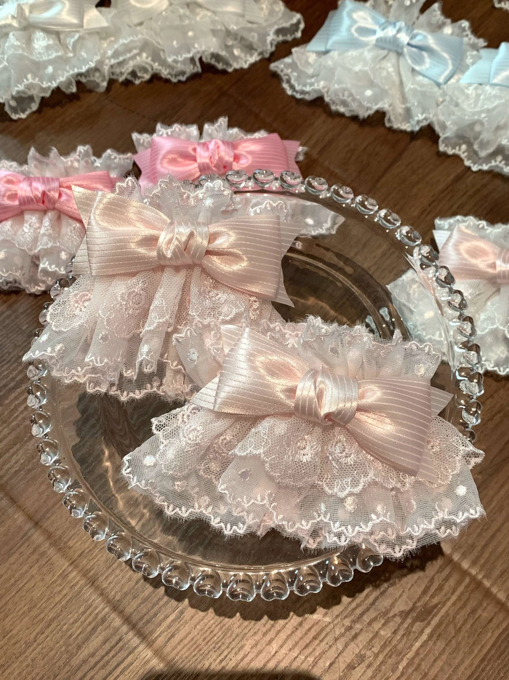 Pink lace Sweet Lolita wrist cuffs with light pink satin bow soft romantic lace bow accessory