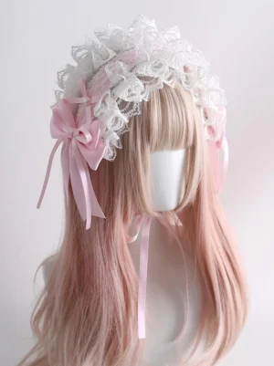 sweet lolita lace headband accessory with white ruffled trim and large pink satin bow featuring flowing ribbon tails worn on mannequin
