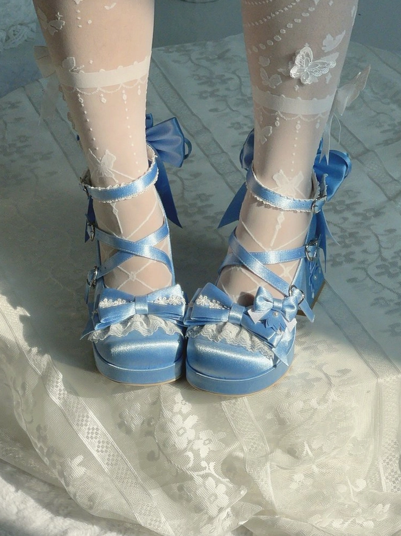 Sweet lolita platform heel shoes worn with coordinated outfit displaying how to style with stockings skirts and lolita fashion aesthetic