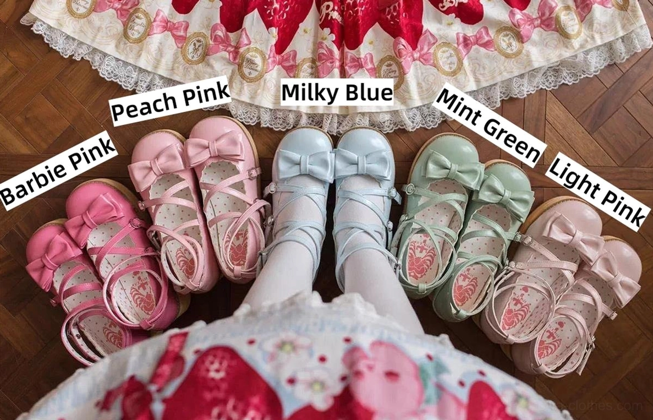 Lolita platform shoes color options laid on strawberry print dress fabric barbie pink peach pink milky blue mint green light pink sweet lolita aesthetic flat lay
