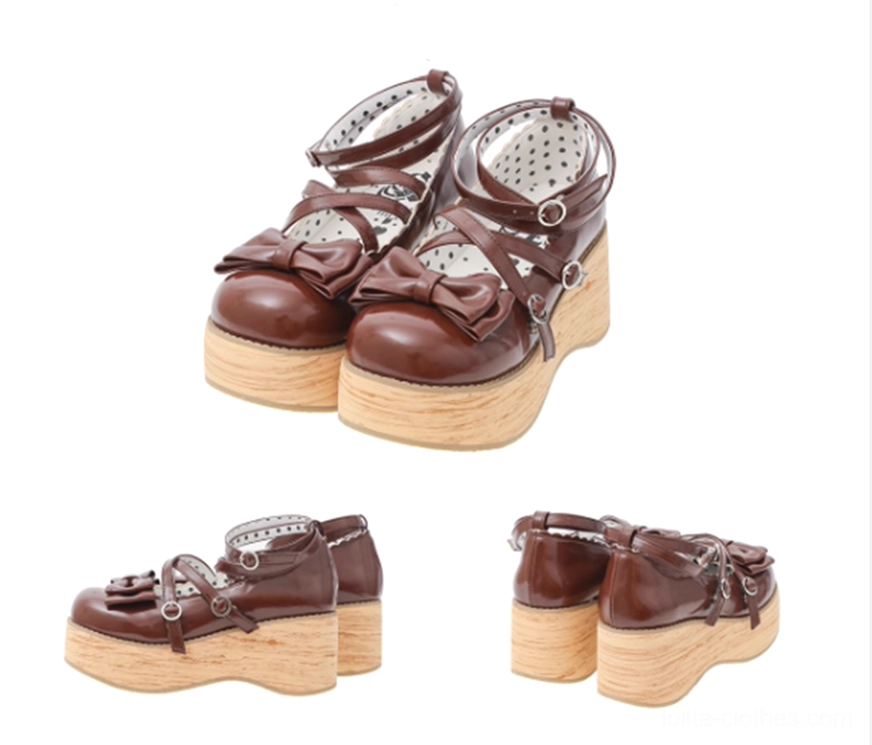 Sweet lolita platform Mary Jane shoes detail shot of bow ornament and patent leather finish showing craftsmanship quality