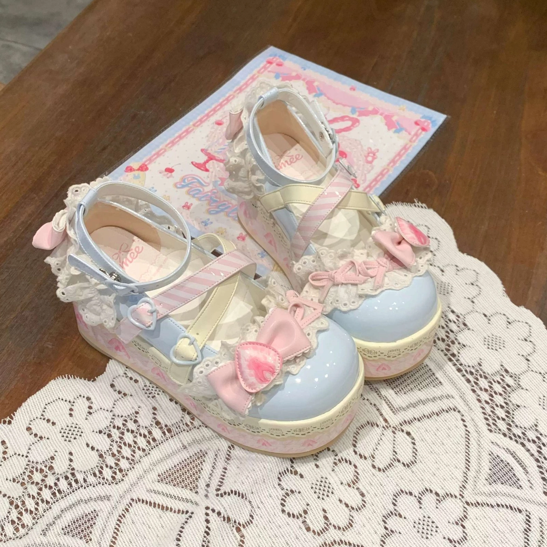 Sweet lolita platform shoes detail shot showcasing adjustable ankle buckle strap system and platform sole construction with cute decorative elements
