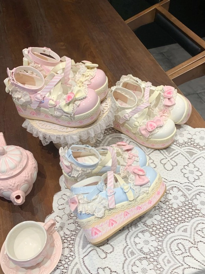 Sweet lolita platform shoes sole view displaying strawberry cake print pattern and rubber imitation leather traction surface