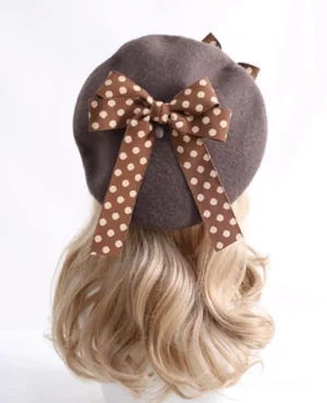 Sweet lolita polka dot bow beret hat in dark brown wool felt, rear top view on mannequin with blonde curly wig, showing fuzzy texture and ribbon bow detail