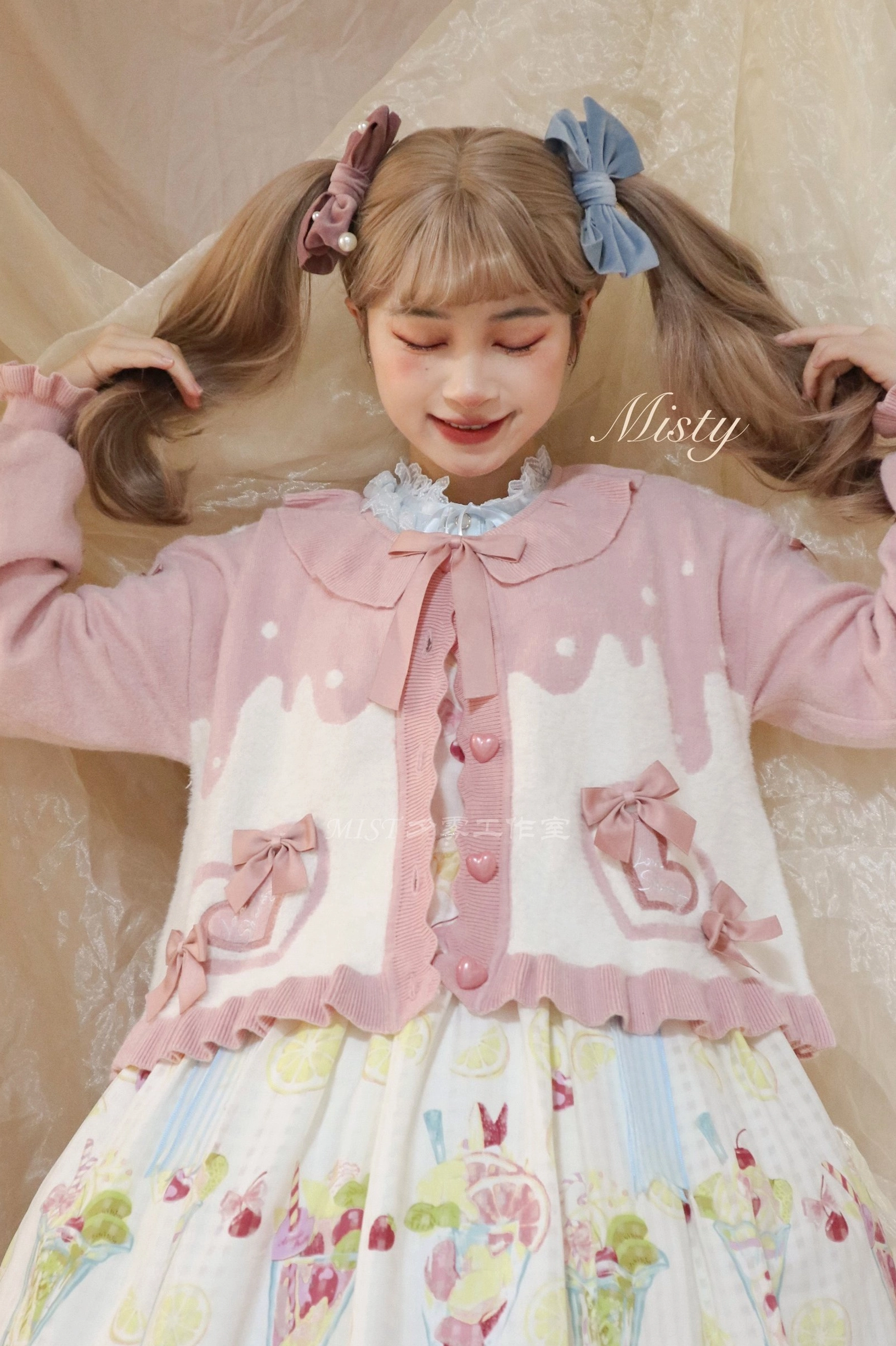 Sweet Lolita puff sleeve cardigan coat layered construction showing depth and volume from multiple angles