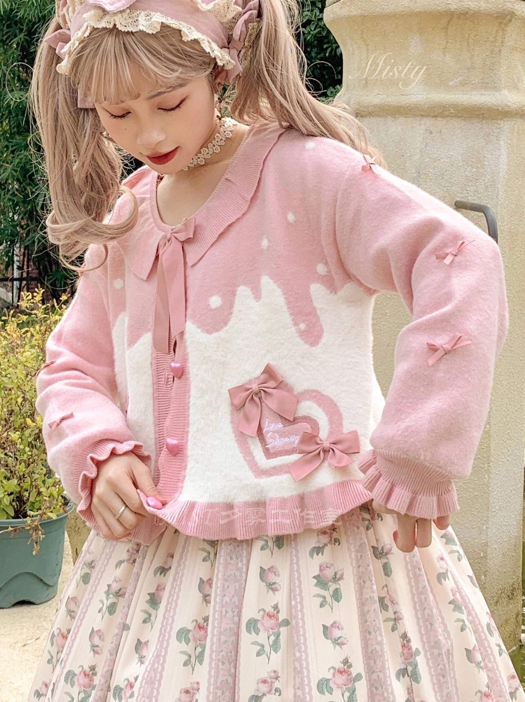 Sweet Lolita puff sleeve cardigan coat detail shot ruffled cuff heart-shaped button close-up texture