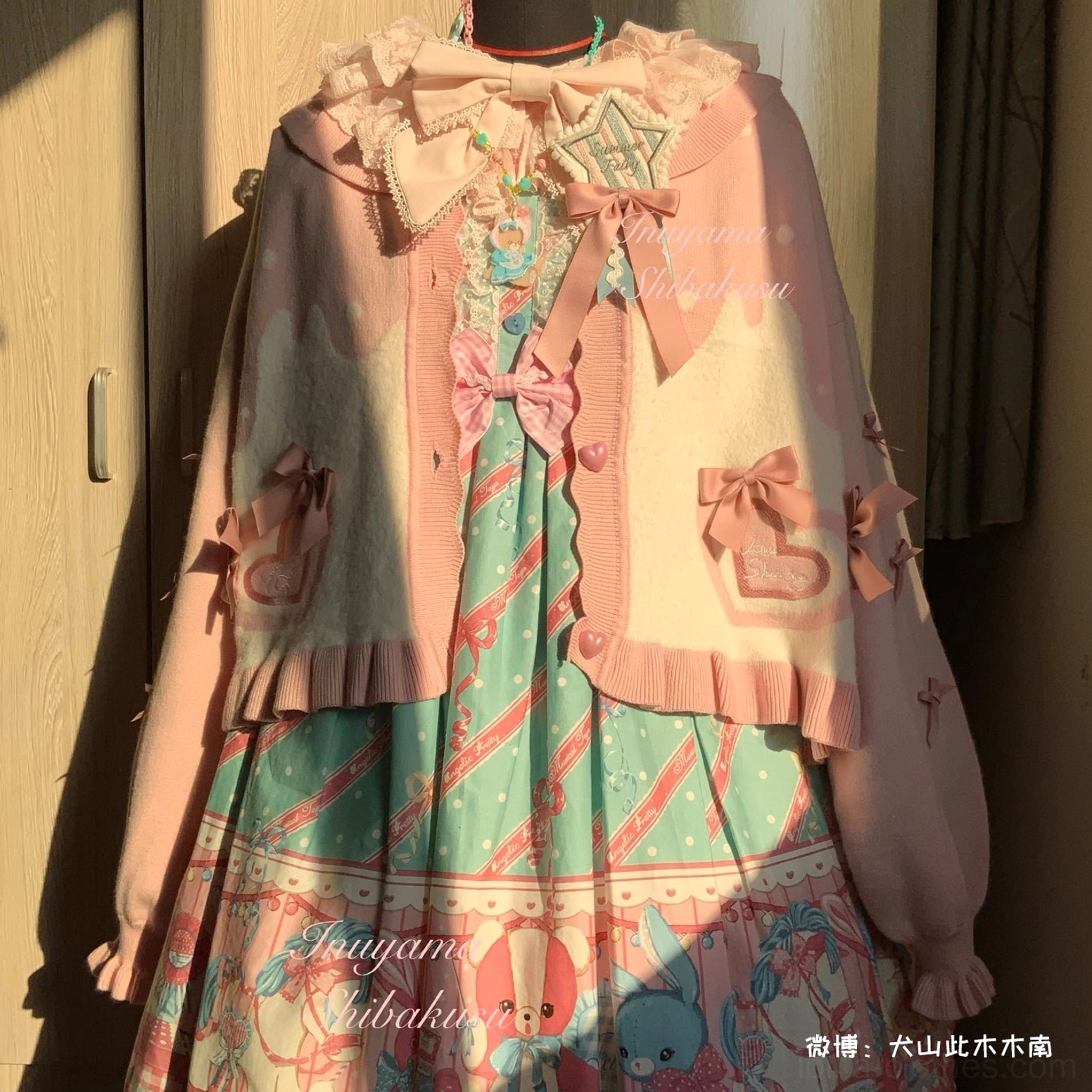 Sweet Lolita puff sleeve cardigan coat styling with doll accessories and aesthetic props