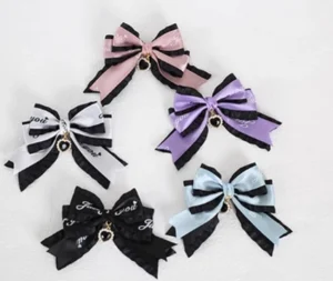 Sweet lolita ribbon bow hair clips black and white letter print design with metal pendant charm and layered ruffled ribbon structure