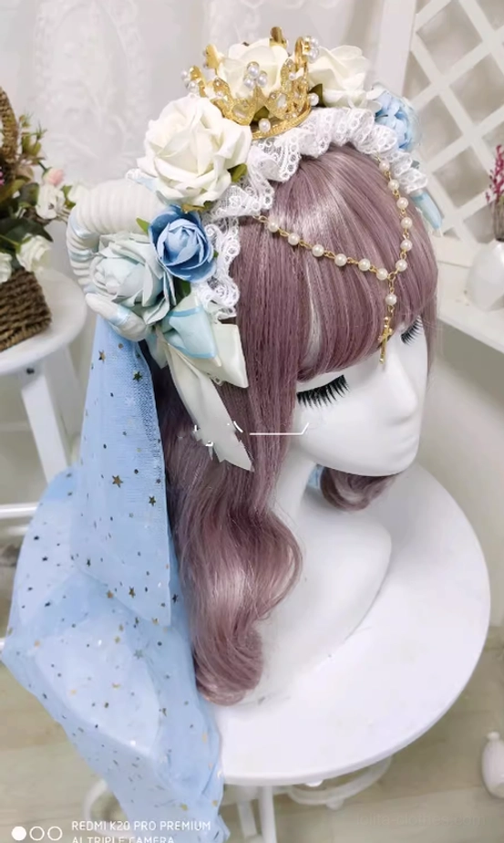 Sweet Lolita rose crown headdress with star-patterned blue veil white and blue roses gold crown lace trim on purple wig mannequin