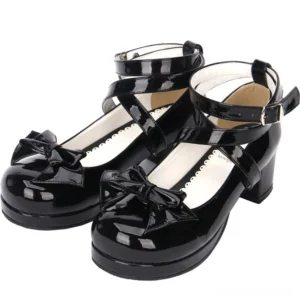 Sweet lolita round toe platform heel shoes black patent leather detachable bow crossover ankle strap buckle paired product front three-quarter view studio shot