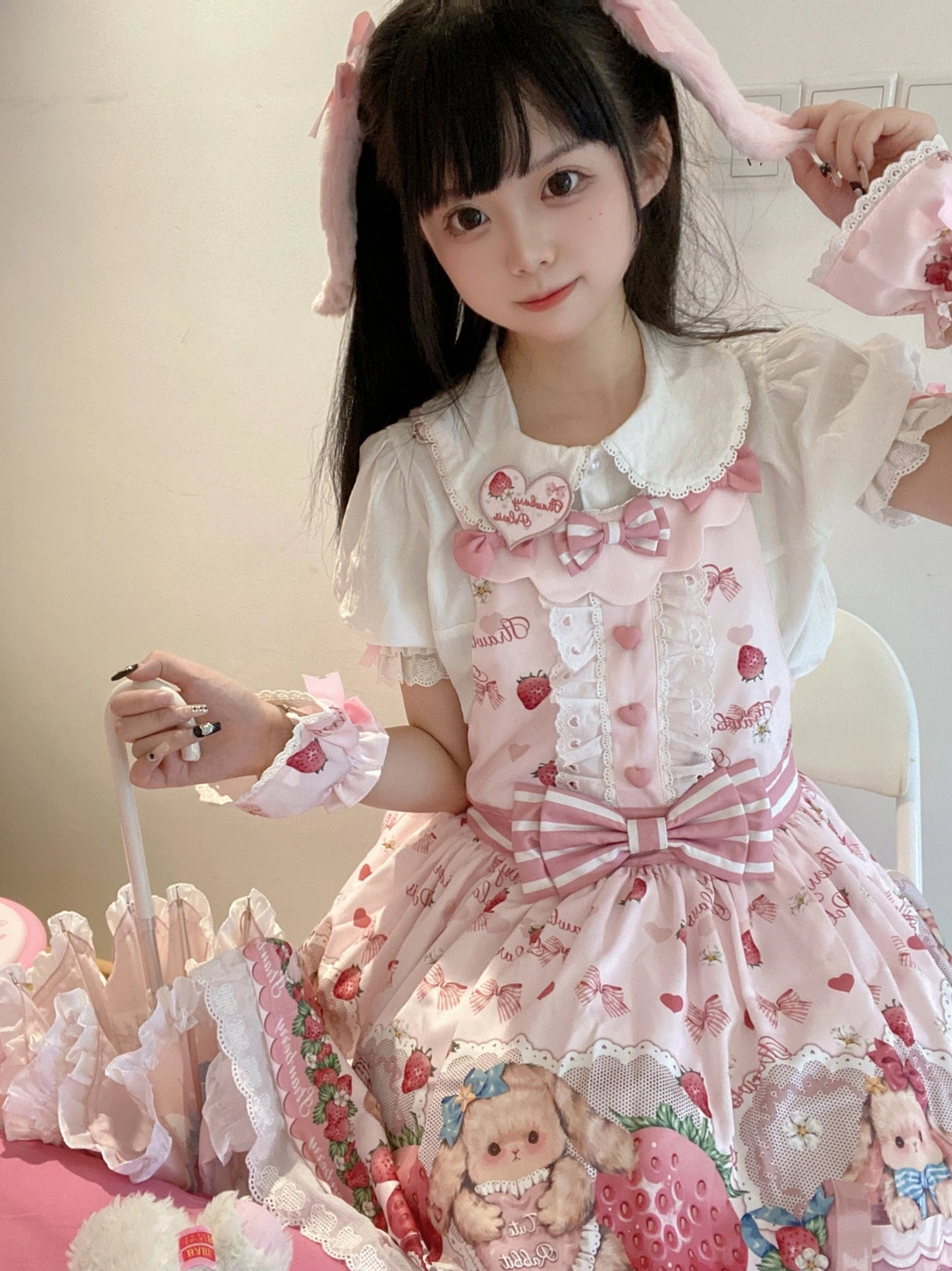 Sweet lolita salopette JSK fabric texture detail showing polyamide material quality and print clarity close-up