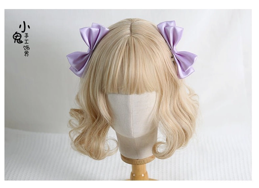 Sweet Lolita bow hair clips size and dimension reference flat lay showing actual product scale and metal alligator clip mechanism for proper fit