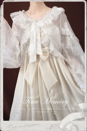 White sweet lolita silver chiffon lantern sleeve cardigan with ruffled V-neck bow worn with beige embroidered lolita dress front close-up detail shot