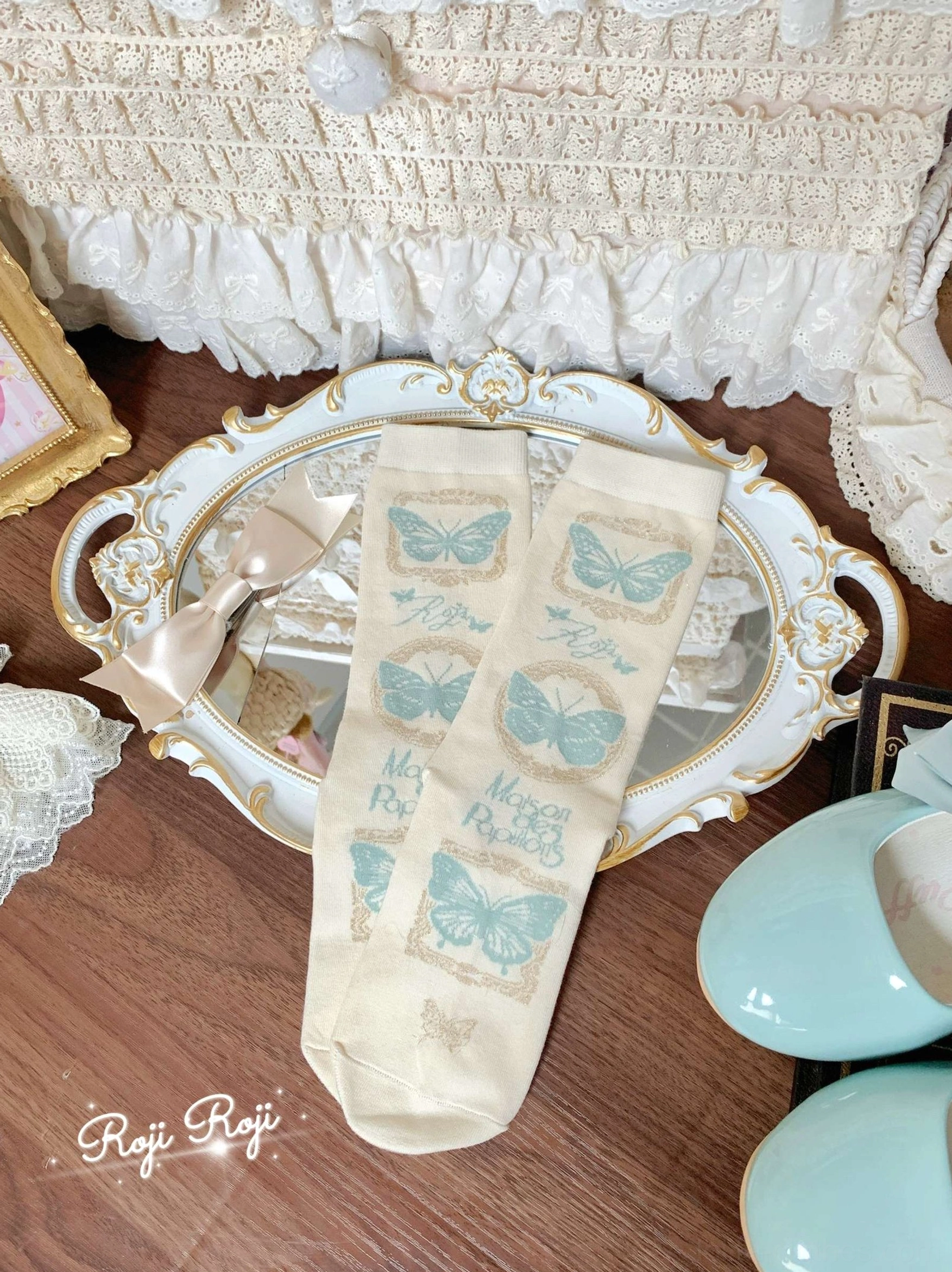 Mint green Sweet Lolita mid-calf cotton socks collection showing socks only and socks with detachable bow trim purchase options