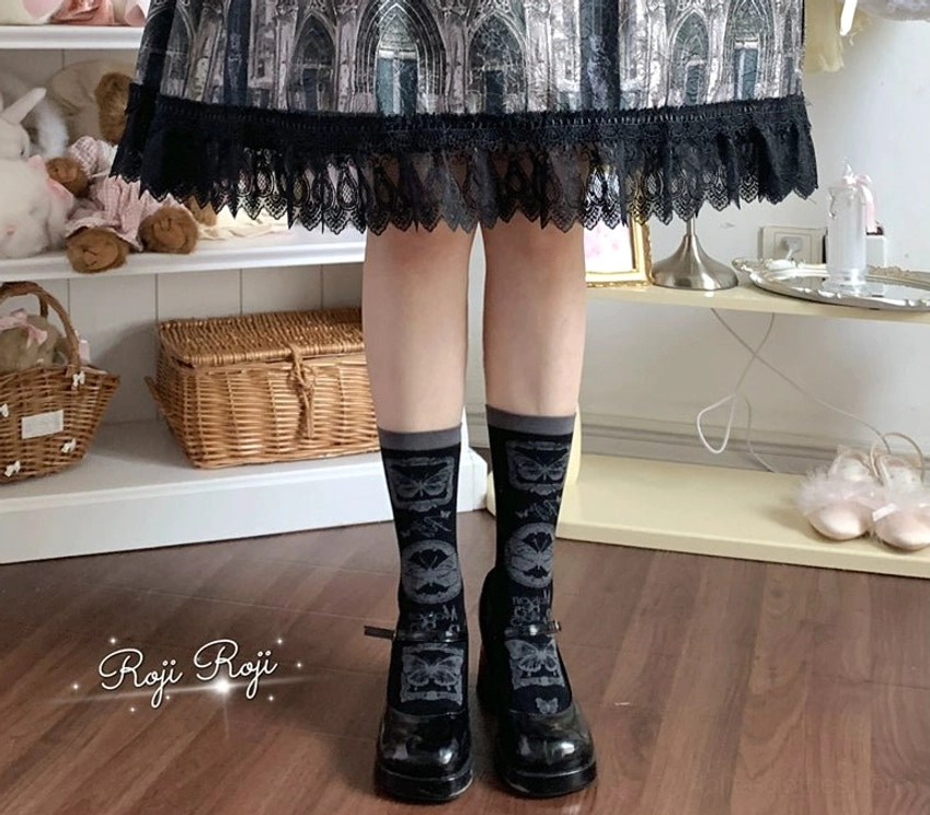 Mint green Sweet Lolita mid-calf socks with ivory detachable bow cuff trim styling option coordinated with Lolita outfit and accessories