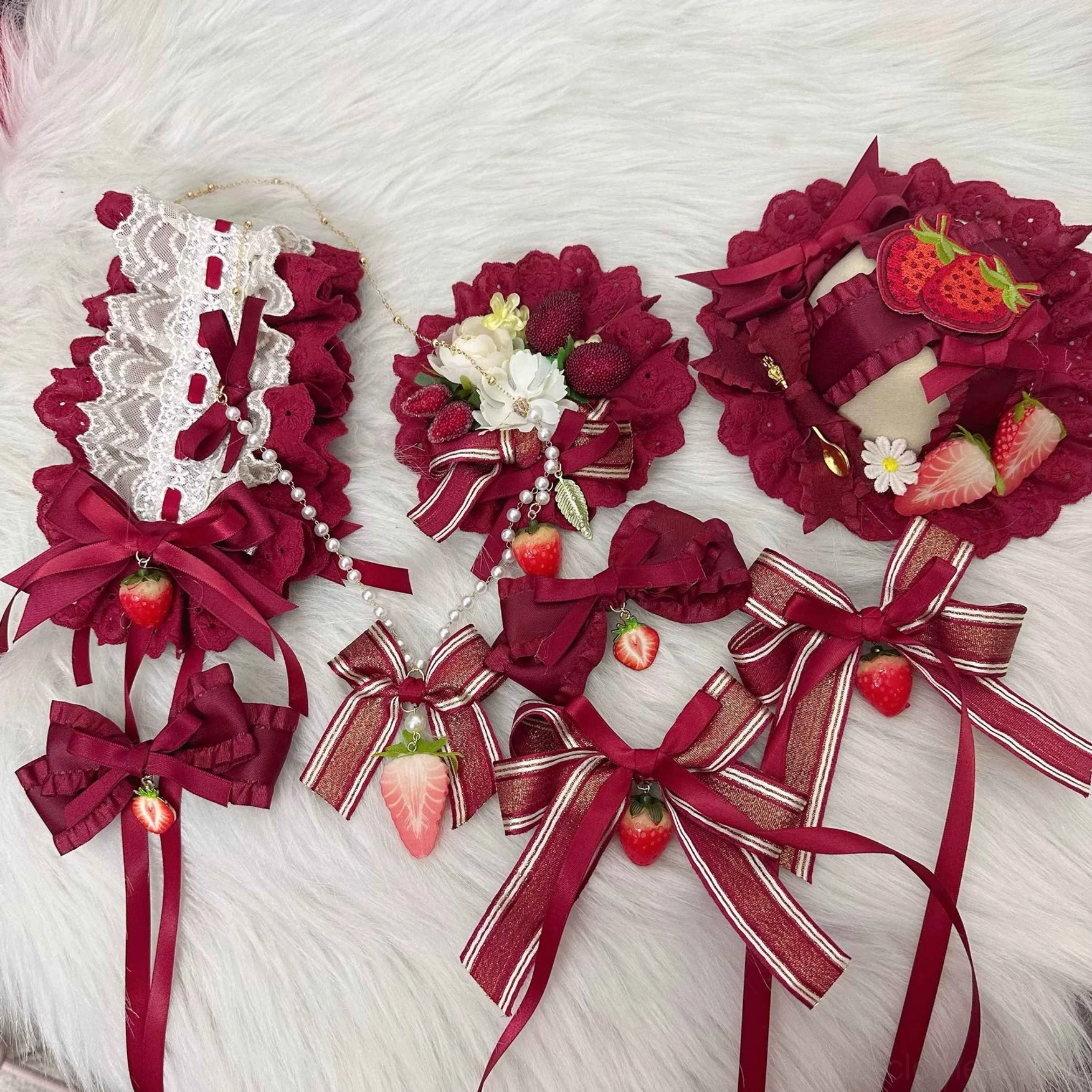 Sweet lolita strawberry themed complete accessory ensemble styled together showing full coordination possibilities and styling versatility