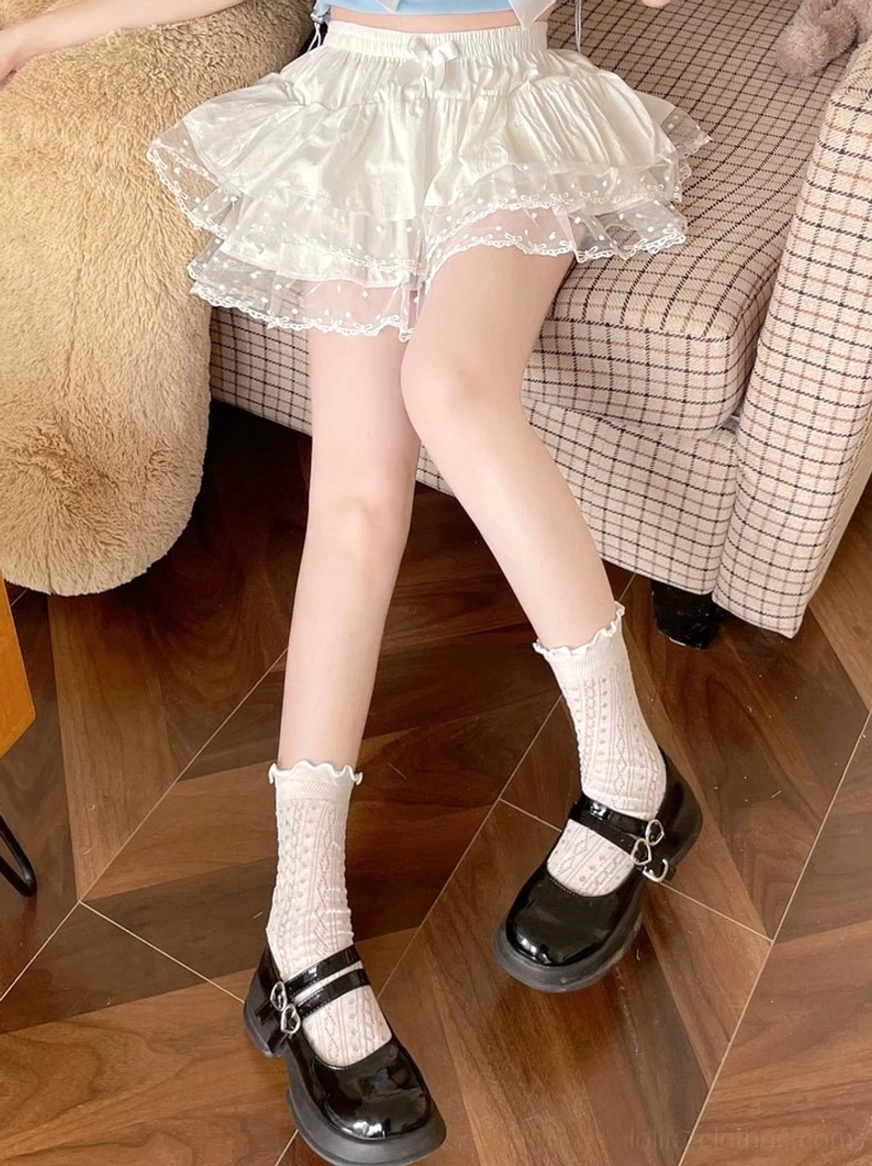Sweet Lolita tiered ruffle bloomers fabric close-up showing premium cotton texture polka dot sheer lace pattern refined ruffle construction and high-quality material composition details