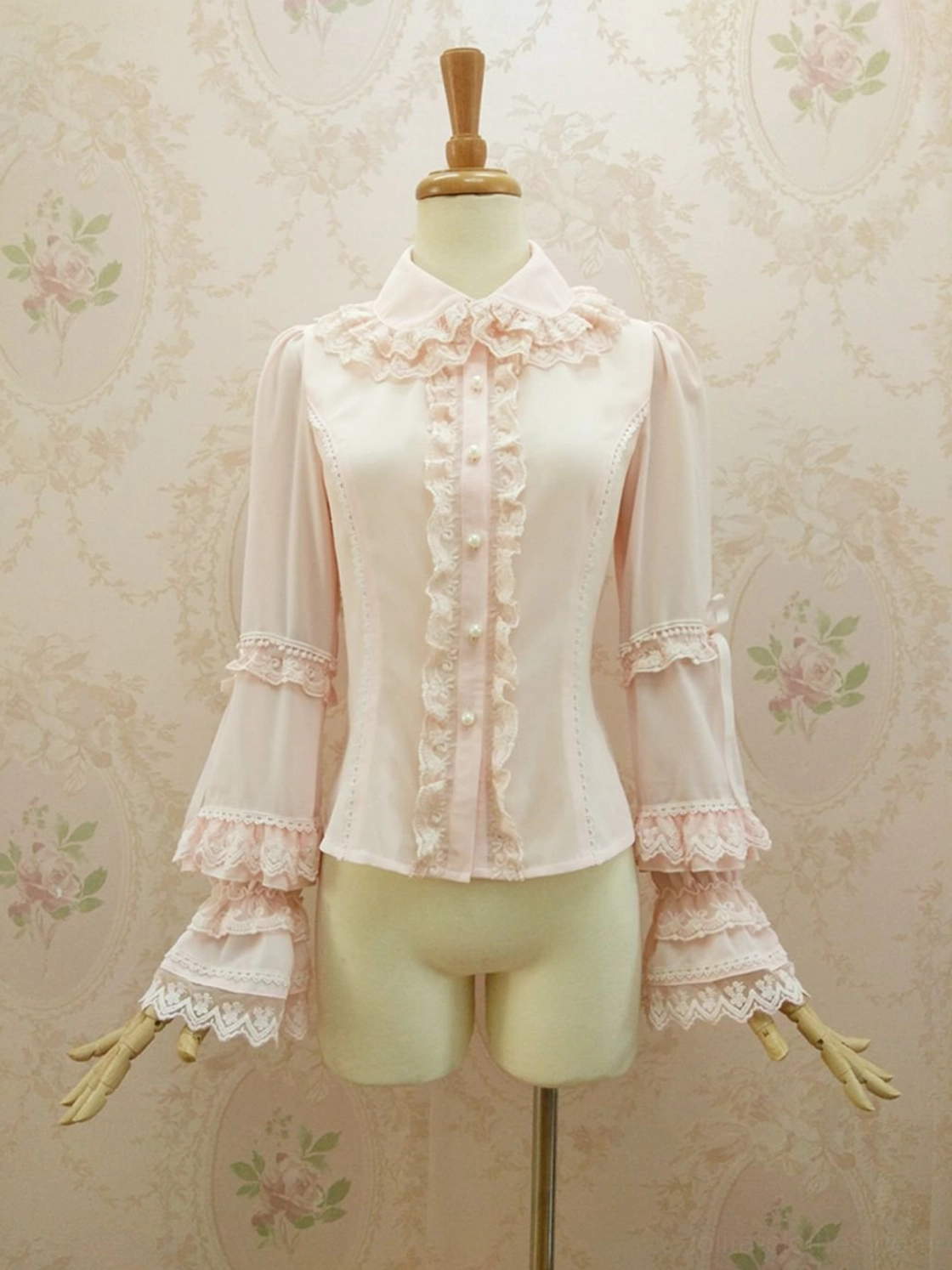 Sweet Lolita double-layer ruffle chiffon blouse front view with peter pan collar and tiered ruffles on mannequin